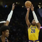 Feb 20, 2025; Portland, Oregon, USA; Los Angeles Lakers forward Rui Hachimura (28) shoots a jump shot during the second half against Portland Trail Blazers center Robert Williams III (35) at Moda Center. Mandatory Credit: Troy Wayrynen-Imagn Images