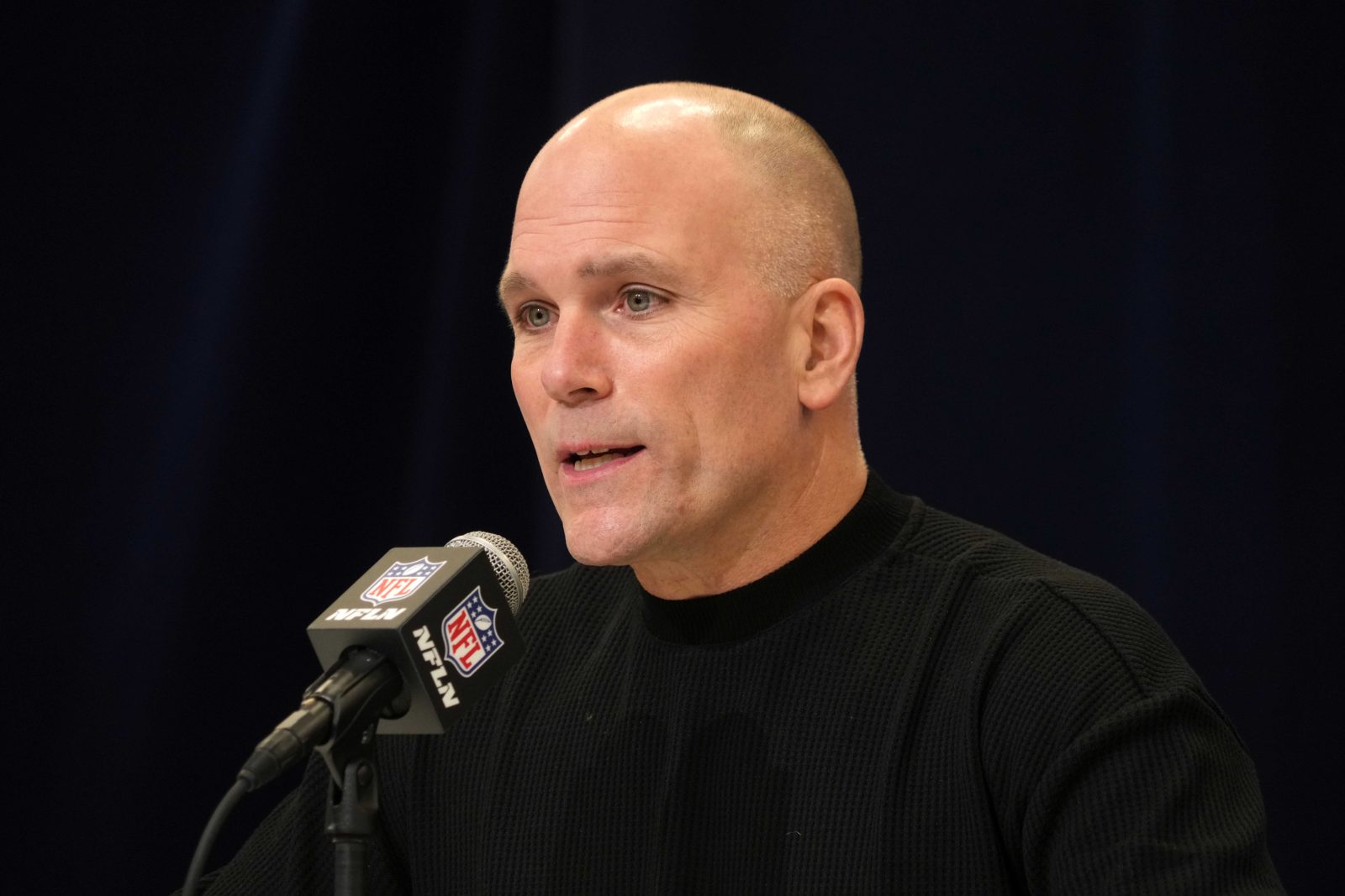 Feb 25, 2025; Indianapolis, IN, USA; Baltimore Ravens general manager Eric DeCosta speaks during the NFL Scouting Combine at the Indiana Convention Center. Mandatory Credit: Kirby Lee-Imagn Images