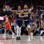 Apr 21, 2025; Denver, Colorado, USA; Denver Nuggets guard Jalen Pickett (24) reacts ahead of forward Peyton Watson (8) after a play in the first quarter against the Los Angeles Clippers during game two of first round for the 2025 NBA Playoffs at Ball Arena. Mandatory Credit: Isaiah J. Downing-Imagn Images