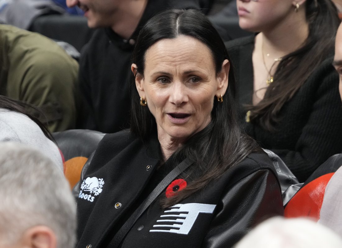 Nov 4, 2025; Toronto, Ontario, CAN; The WNBA Toronto Tempo head coach Sandy Brondello sits courtside during a game between the Milwaukee Bucks and Toronto Raptors at Scotiabank Arena. Mandatory Credit: John E. Sokolowski-Imagn Images