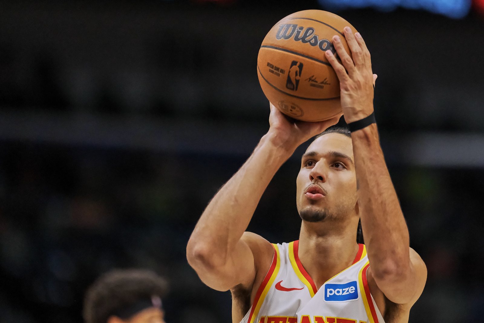 Nov 22, 2025; New Orleans, Louisiana, USA; Atlanta Hawks forward Zaccharie Risacher (10) shoots a free throw against the New Orleans Pelicans during the first half of the game at the Smoothie King Center.