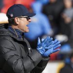 Dec 14, 2025; Kansas City, Missouri, USA; Los Angeles Chargers head coach Jim Harbaugh observes pregame warmups against the Kansas City Chiefs at GEHA Field at Arrowhead Stadium. Mandatory Credit: Denny Medley-Imagn Images