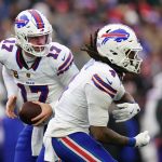 Dec 14, 2025; Foxborough, Massachusetts, USA; Buffalo Bills quarterback Josh Allen (17) fakes the hand off to running back James Cook III (4) against the New England Patriots in the second half at Gillette Stadium. Mandatory Credit: David Butler II-Imagn Images