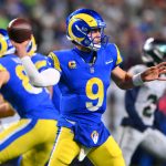 Dec 18, 2025; Seattle, Washington, USA; Los Angeles Rams quarterback Matthew Stafford (9) throws a pass against the Seattle Seahawks in overtime at Lumen Field. Mandatory Credit: Steven Bisig-Imagn Images