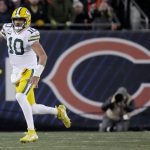 Green Bay Packers quarterback Jordan Love (10) rolls out during the first quarter of their game against the Chicago Bears Saturday, December 20, 2025 at Soldier Field in Chicago, Illinois.