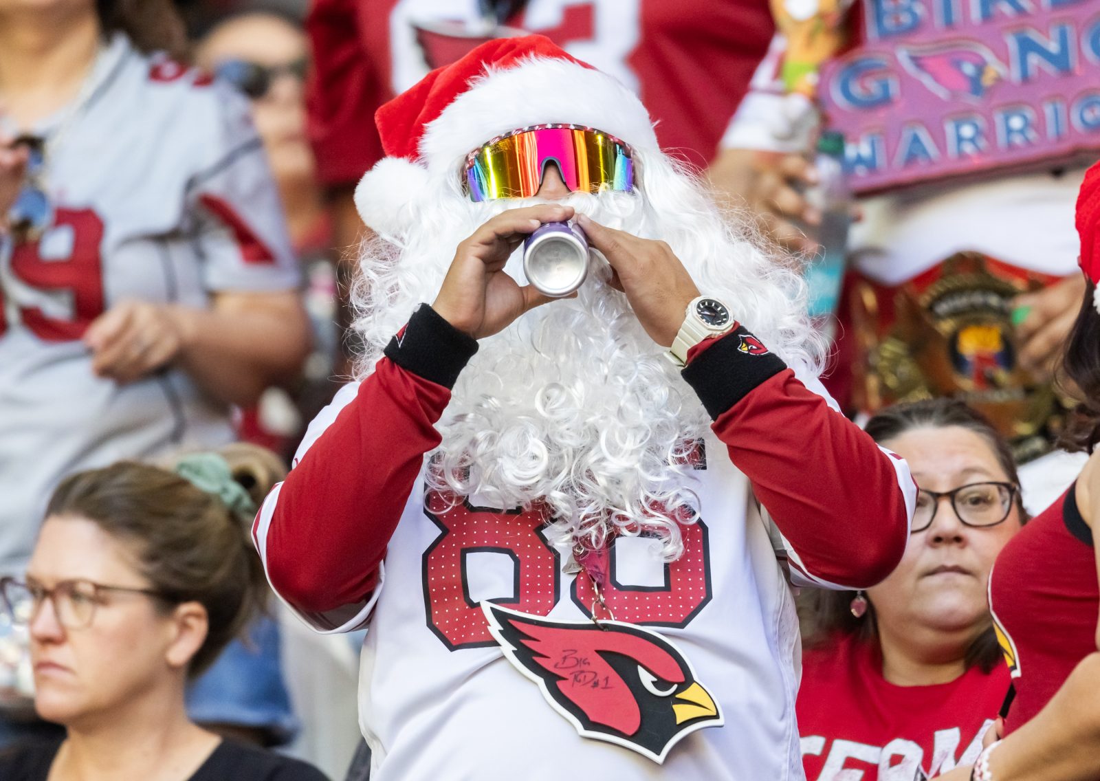 Dec 21, 2025; Glendale, Arizona, USA; Arizona Cardinals fan in the crowd dressed as Santa Claus during the game at State Farm Stadium. Mandatory Credit: Mark J. Rebilas-Imagn Images