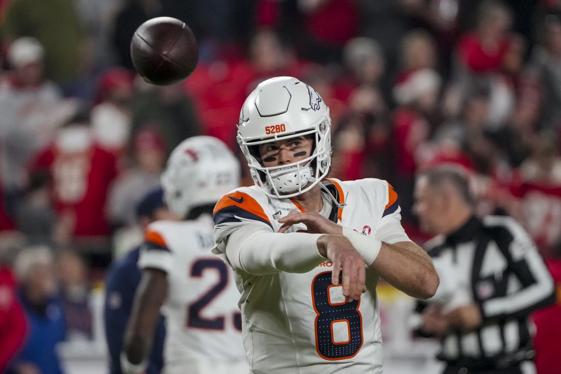 Dec 25, 2025; Kansas City, Missouri, USA; Denver Broncos quarterback Jarrett Stidham (8) warms up before the game at GEHA Field at Arrowhead Stadium.