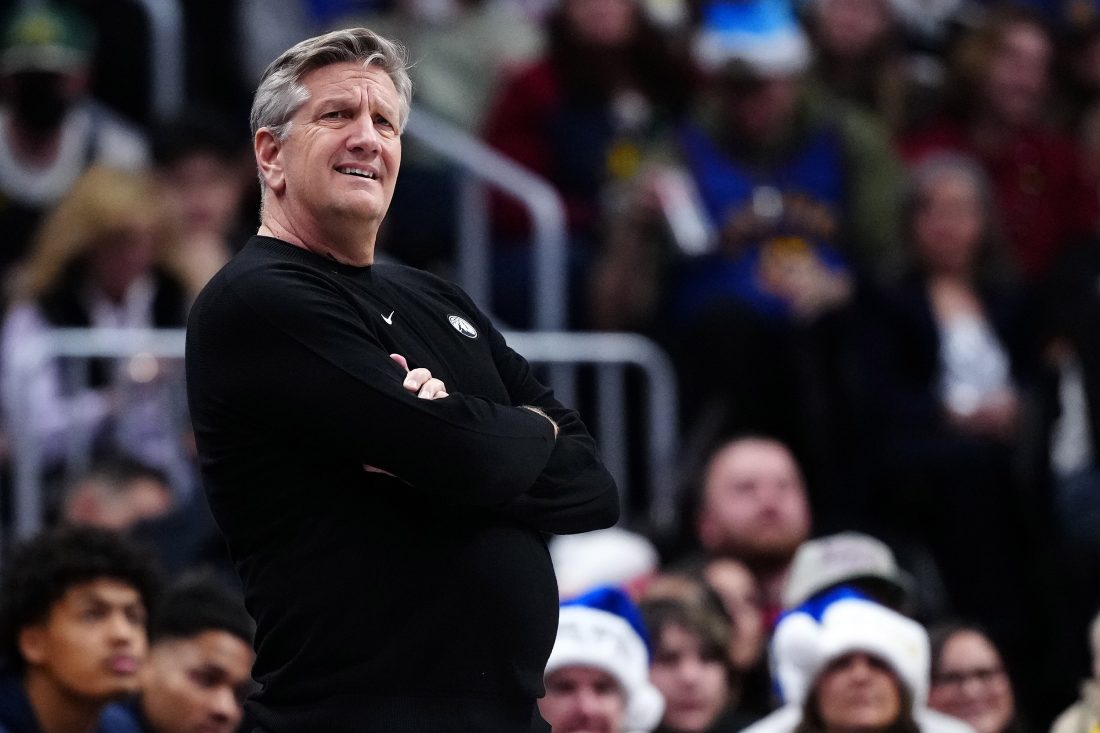 Dec 25, 2025; Denver, Colorado, USA; Minnesota Timberwolves head coach Chris Finch reacts against the Denver Nuggets during the first half at Ball Arena.