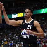Dec 25, 2025; Denver, Colorado, USA; Denver Nuggets forward Spencer Jones (21) reacts against the Minnesota Timberwolves during the second half at Ball Arena.
