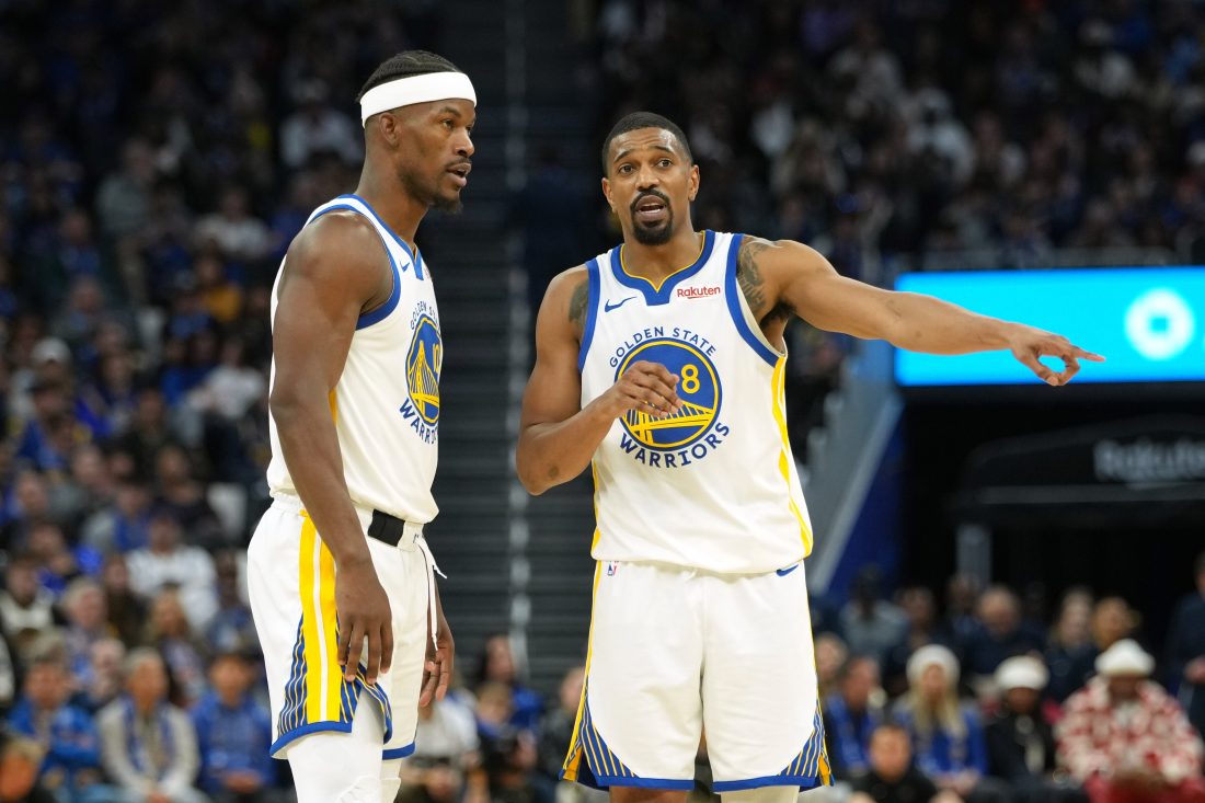 Dec 25, 2025; San Francisco, California, USA; Golden State Warriors guard De'Anthony Melton (8) talks with forward Jimmy Butler III (10) during the fourth quarter against the Dallas Mavericks at Chase Center. Mandatory Credit: Darren Yamashita-Imagn Images