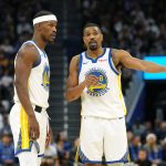 Dec 25, 2025; San Francisco, California, USA; Golden State Warriors guard De'Anthony Melton (8) talks with forward Jimmy Butler III (10) during the fourth quarter against the Dallas Mavericks at Chase Center. Mandatory Credit: Darren Yamashita-Imagn Images