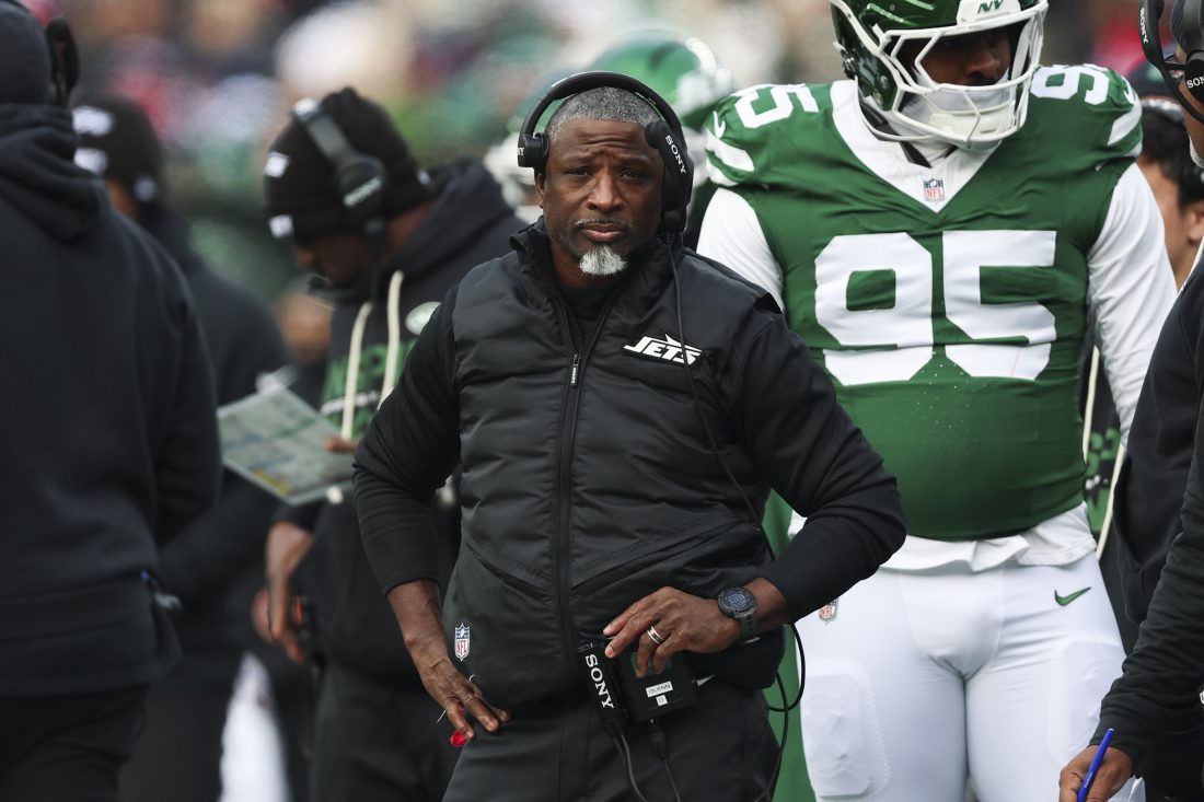 Dec 28, 2025; East Rutherford, New Jersey, USA; New York Jets head coach Aaron Glenn reacts during the first quarter of the game against the New England Patriots at MetLife Stadium.