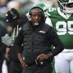 Dec 28, 2025; East Rutherford, New Jersey, USA; New York Jets head coach Aaron Glenn reacts during the first quarter of the game against the New England Patriots at MetLife Stadium.
