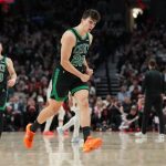 Dec 28, 2025; Portland, Oregon, USA; Boston Celtics guard Hugo Gonzalez (28) celebrates after making a three-point basket during the second half against the Portland Trail Blazers at Moda Center.