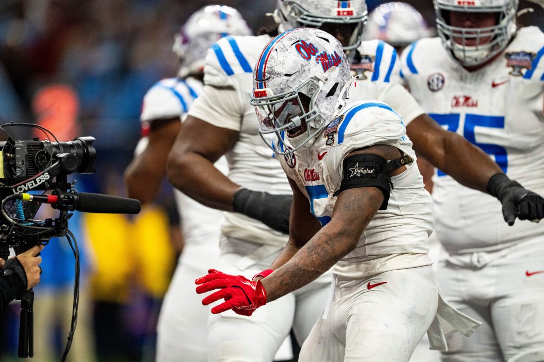 Ole Miss running back Kewan Lacy (5) celebrates with a camera during the Sugar Bowl and College Football Playoff quarterfinals at Caesars Superdome in New Orleans, La., on Thursday, Jan. 1, 2026. Ole Miss defeated Georgia 39-34.
