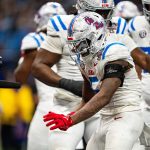Ole Miss running back Kewan Lacy (5) celebrates with a camera during the Sugar Bowl and College Football Playoff quarterfinals at Caesars Superdome in New Orleans, La., on Thursday, Jan. 1, 2026. Ole Miss defeated Georgia 39-34.