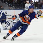 Jan 3, 2026; Elmont, New York, USA; New York Islanders defenseman Matthew Schaefer (48) celebrates after scoring the winning goal in overtime against the Toronto Maple Leafs at UBS Arena.