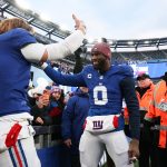 Jan 4, 2026; East Rutherford, New Jersey, USA; New York Giants linebacker Brian Burns (0) greets New York Giants quarterback Jaxson Dart (6) after the game against the Dallas Cowboys at MetLife Stadium.