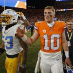 Jan 4, 2026; Denver, Colorado, USA; Denver Broncos quarterback Bo Nix (10) looks on after winning the game against the Los Angeles Chargers at Empower Field at Mile High. Mandatory Credit: Isaiah J. Downing-Imagn Images