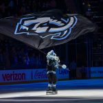 Jan 7, 2026; Salt Lake City, Utah, USA; Utah Mammoth mascot waves the flag after the team defeats the Ottawa Senators at Delta Center. Mandatory Credit: Peter Creveling-Imagn Images