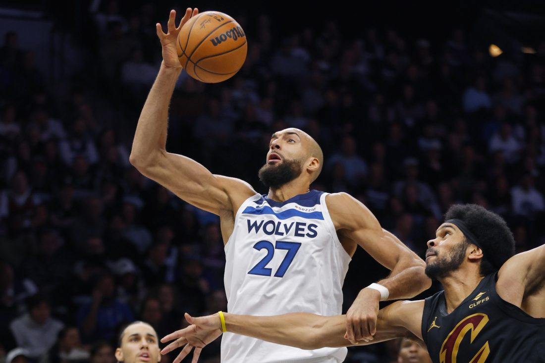 Jan 8, 2026; Minneapolis, Minnesota, USA; Minnesota Timberwolves center Rudy Gobert (27) battles Cleveland Cavaliers center Jarrett Allen (31) for the ball in the third quarter at Target Center. Mandatory Credit: Bruce Kluckhohn-Imagn Images