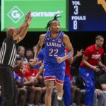 Jan 10, 2026; Morgantown, West Virginia, USA; Kansas Jayhawks guard Darryn Peterson (22) celebrates after a three point basket during the second half against the West Virginia Mountaineers at Hope Coliseum.
