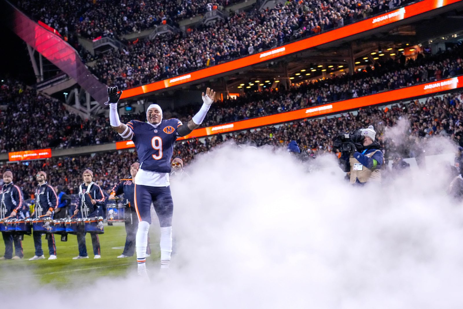 Jan 10, 2026; Chicago, IL, USA; Chicago Bears safety Jaquan Brisker (9) takes the field prior to an NFC Wild Card Round game against the Green Bay Packers at Soldier Field.