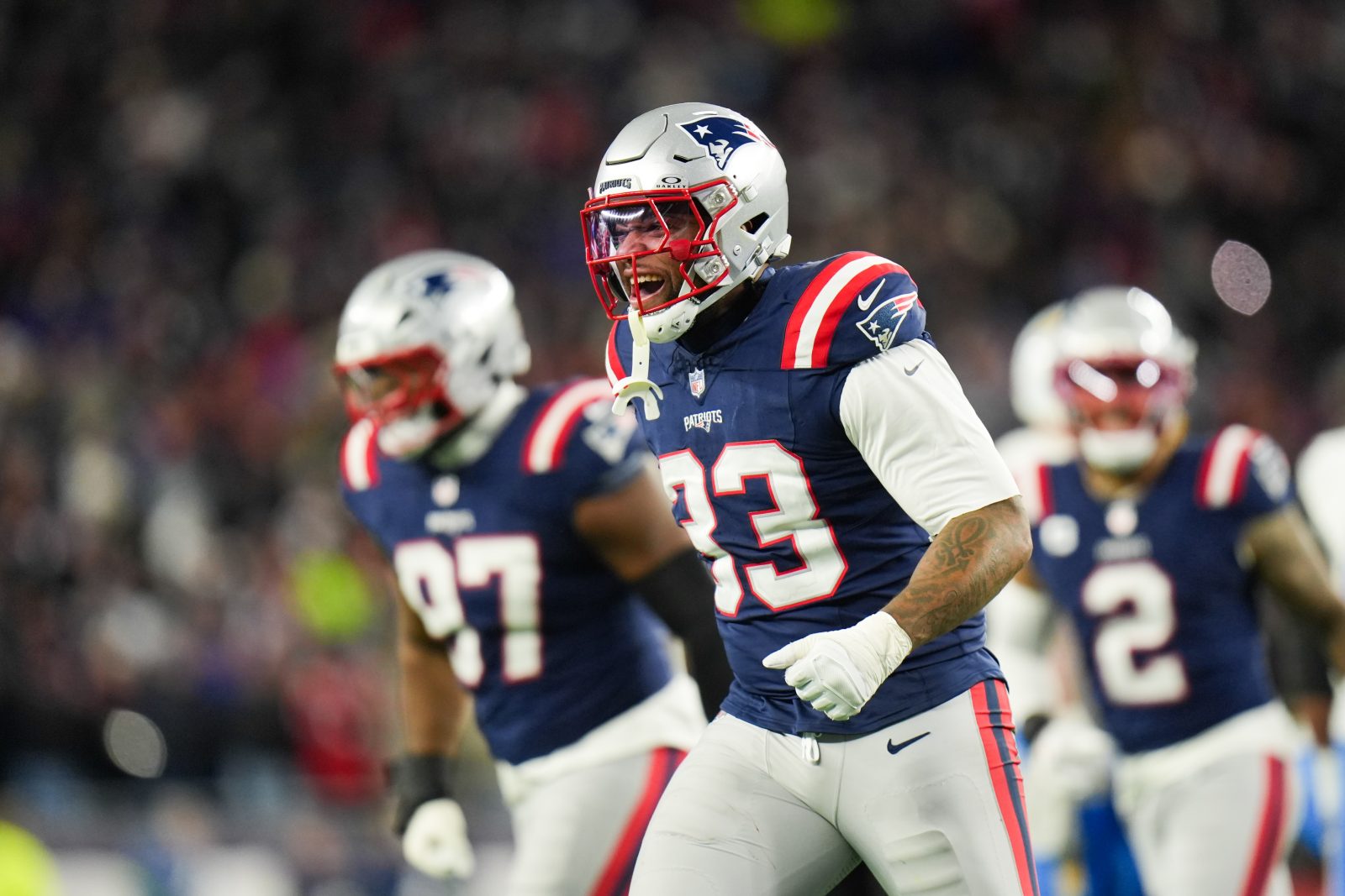 Jan 11, 2026; Foxborough, MA, USA; New England Patriots linebacker Anfernee Jennings (33) celebrates a sack during the fourth quarter against the Los Angeles Chargers in an AFC Wild Card Round game at Gillette Stadium.
