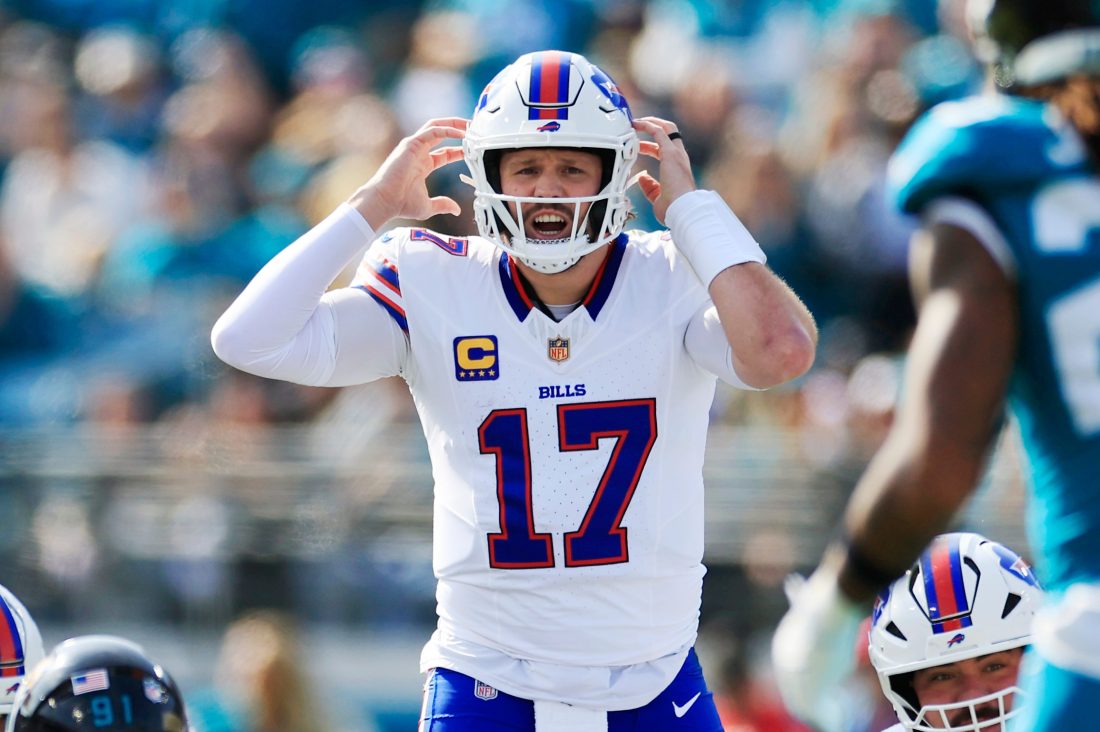 Buffalo Bills quarterback Josh Allen (17) calls a play during the first quarter of an NFL football AFC Wild Card playoff matchup, Sunday, Jan. 11, 2026, in Jacksonville, Fla. The Bills defeated the Jaguars 27-24.