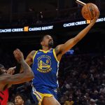 Jan 13, 2026; San Francisco, California, USA; Golden State Warriors guard De'Anthony Melton (8) drives to the basket against Portland Trail Blazers center/forward Robert Williams III (35) in the third quarter at Chase Center.