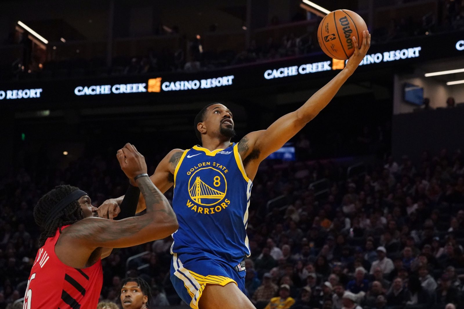 Jan 13, 2026; San Francisco, California, USA; Golden State Warriors guard De'Anthony Melton (8) drives to the basket against Portland Trail Blazers center/forward Robert Williams III (35) in the third quarter at Chase Center.