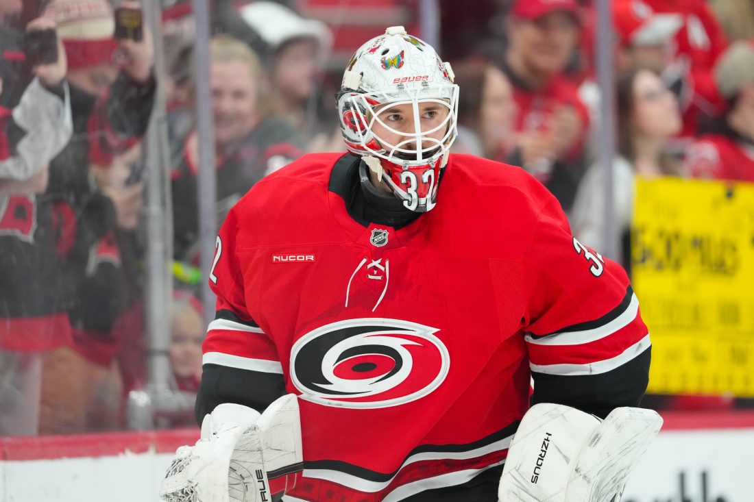 Jan 16, 2026; Raleigh, North Carolina, USA; Carolina Hurricanes goaltender Brandon Bussi (32) skates during the warmups before the game against the Florida Panthers at Lenovo Center. Mandatory Credit: James Guillory-Imagn Images