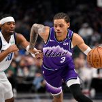 Jan 17, 2026; Dallas, Texas, USA; Utah Jazz guard Keyonte George (3) drives to the basket past Dallas Mavericks guard Brandon Williams (10) during the second quarter at the American Airlines Center.