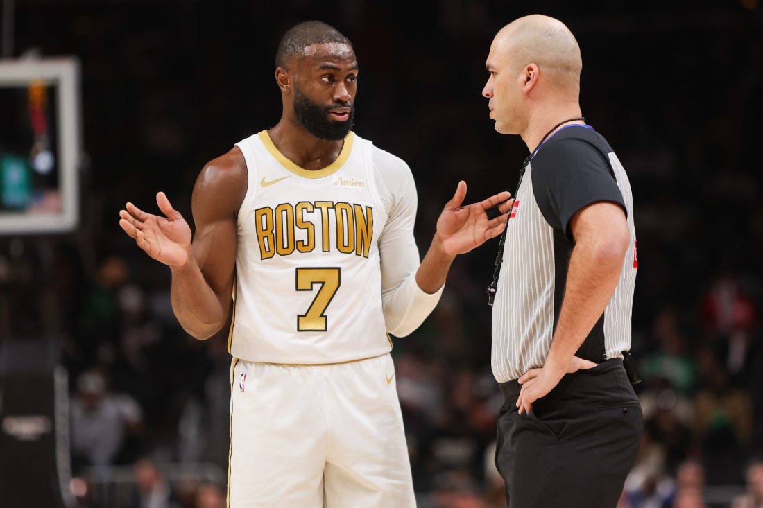 Jan 17, 2026; Atlanta, Georgia, USA; Boston Celtics guard Jaylen Brown (7) talks to a referee against the Atlanta Hawks in the first quarter at State Farm Arena. Mandatory Credit: Brett Davis-Imagn Images