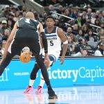 Jan 17, 2026; San Antonio, Texas, USA; Minnesota Timberwolves guard Anthony Edwards (5) dribbles in front of San Antonio Spurs forward Victor Wembanyama (1) in the first half at Frost Bank Center. Mandatory Credit: Daniel Dunn-Imagn Images