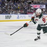Jan 19, 2026; Toronto, Ontario, CAN; Minnesota Wild forward Kirill Kaprizov (97) shoots the puck against the Toronto Maple Leafs during the second period at Scotiabank Arena. Mandatory Credit: John E. Sokolowski-Imagn Images