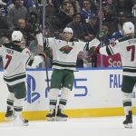 Jan 19, 2026; Toronto, Ontario, CAN; Minnesota Wild forward Marcus Foligno (17) (center) celebrates with defenseman Brock Faber (7) and forward Nico Sturm (78) after scoring his third goal of the game against the Toronto Maple Leafs during the third period at Scotiabank Arena. Mandatory Credit: John E. Sokolowski-Imagn Images