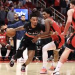 Jan 20, 2026; Houston, Texas, USA;San Antonio Spurs guard Stephon Castle (5) dribbles against Houston Rockets guard Amen Thompson (1) in the second half at Toyota Center. Mandatory Credit: Thomas Shea-Imagn Images
