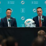 Jan 22, 2026; Miami Gardens, FL, USA; Miami Dolphins head coach Jeff Hafley, right, joined by general manager Jon-Eric Sullivan, left, speak to reporters during their introductory press conference at Baptist Health Training Complex. Mandatory Credit: Sam Navarro-Imagn Images