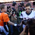 Jan 19, 2014; Denver, CO, USA; Denver Broncos quarterback Peyton Manning (18) and New England Patriots quarterback Tom Brady (12) shake hands after the 2013 AFC championship playoff football game at Sports Authority Field at Mile High. Mandatory Credit: Matthew Emmons-USA TODAY Sports