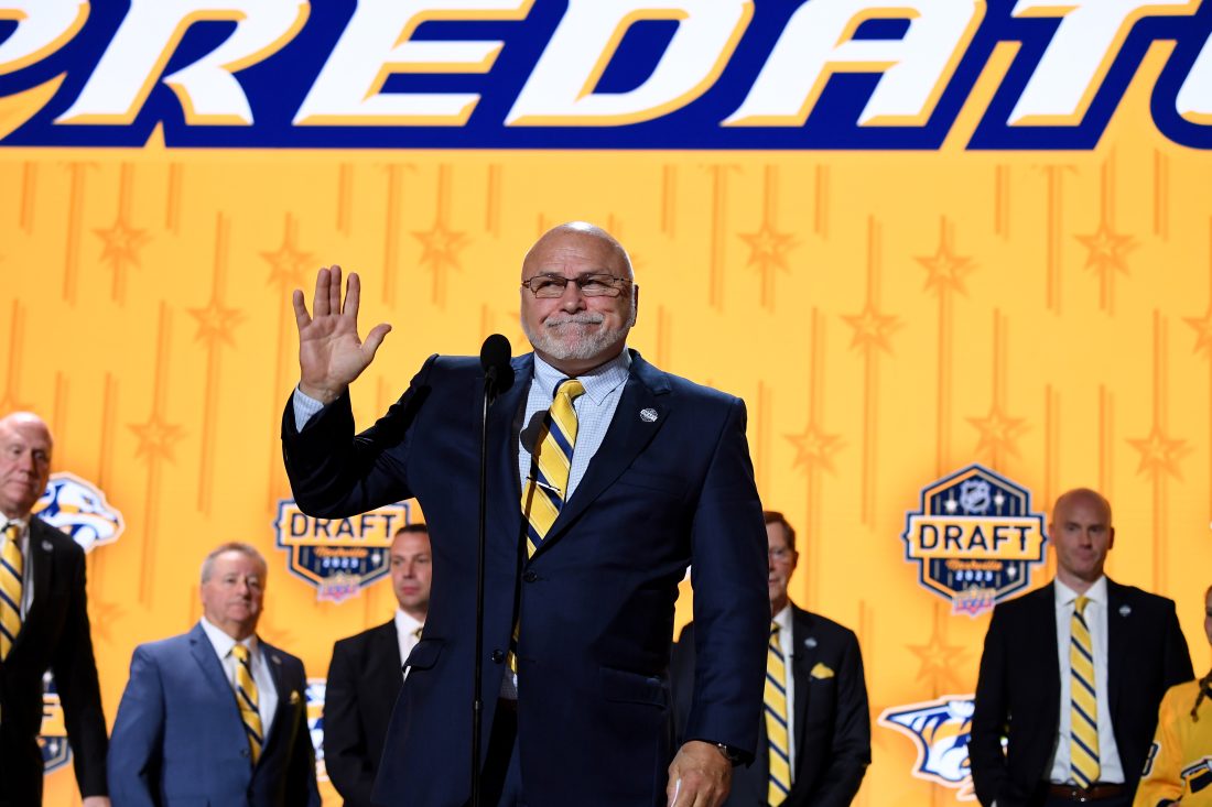 Jun 28, 2023; Nashville, Tennessee, USA; Nashville Predators incoming general manager Barry Trotz announces the twenty fourth pick in round one of the 2023 NHL Draft at Bridgestone Arena.