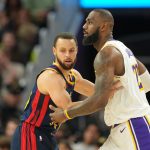 Jan 25, 2025; San Francisco, California, USA; Golden State Warriors guard Stephen Curry (left) defends against Los Angeles Lakers forward LeBron James (right) during the fourth quarter at Chase Center. Mandatory Credit: Darren Yamashita-Imagn Images