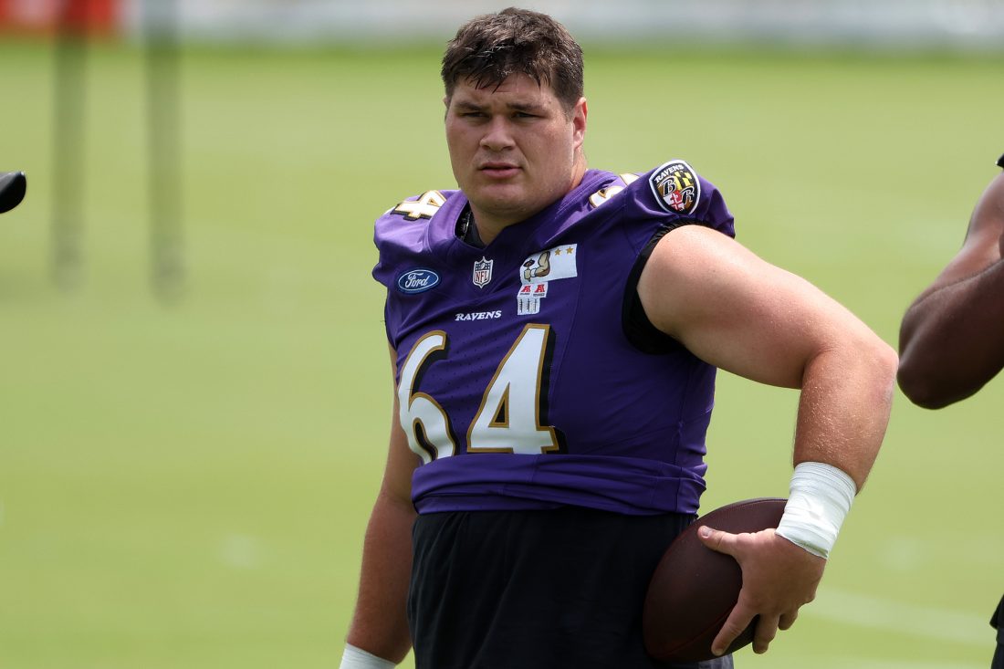 Jun 10, 2025; Baltimore, MD, USA; Baltimore Ravens center Tyler Linderbaum (64) looks on during an NFL OTA at Under Armour Performance Center.