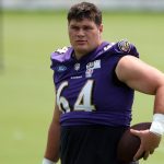 Jun 10, 2025; Baltimore, MD, USA; Baltimore Ravens center Tyler Linderbaum (64) looks on during an NFL OTA at Under Armour Performance Center.