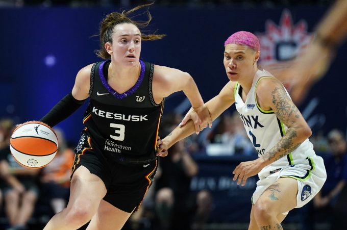 Aug 30, 2025; Uncasville, Connecticut, USA; Connecticut Sun guard Marina Mabrey (3) returns the ball against Minnesota Lynx guard Natisha Hiedeman (2) in the first half at Mohegan Sun Arena. Mandatory Credit: David Butler II-Imagn Images