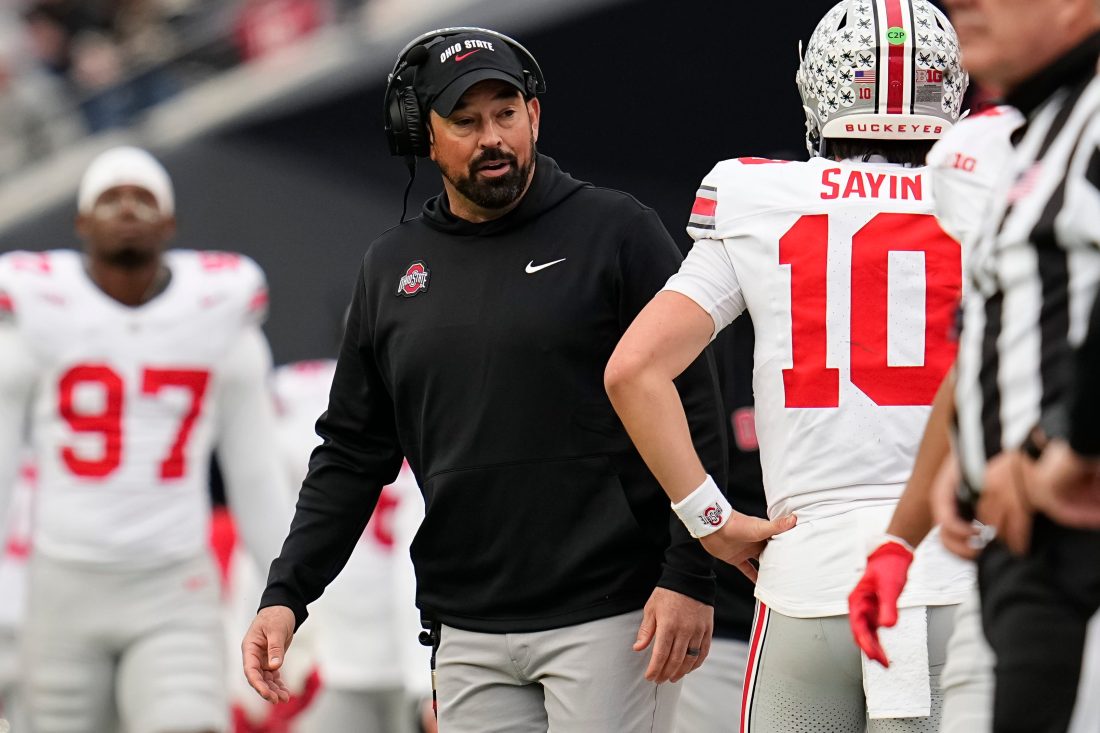 Ohio State Buckeyes head coach Ryan Day talks to quarterback Julian Sayin (10) during the NCAA football game against the Purdue Boilermakers at Ross-Ade Stadium in West Lafayette, Ind. on Nov. 8, 2025. Ohio State won 34-10.