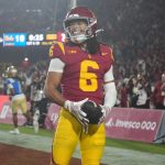 Nov 29, 2025; Los Angeles, California, USA; Southern California Trojans wide receiver Makai Lemon (6) celebrates after catching a 32-yard touchdown pass against the UCLA Bruins in the second half at United Airlines Field at Los Angeles Memorial Coliseum. Mandatory Credit: