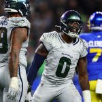 Dec 18, 2025; Seattle, Washington, USA; Seattle Seahawks defensive end Demarcus Lawrence (0) celebrates a sack against the Los Angeles Rams in the second half at Lumen Field. Mandatory Credit: Kevin Ng-Imagn Images