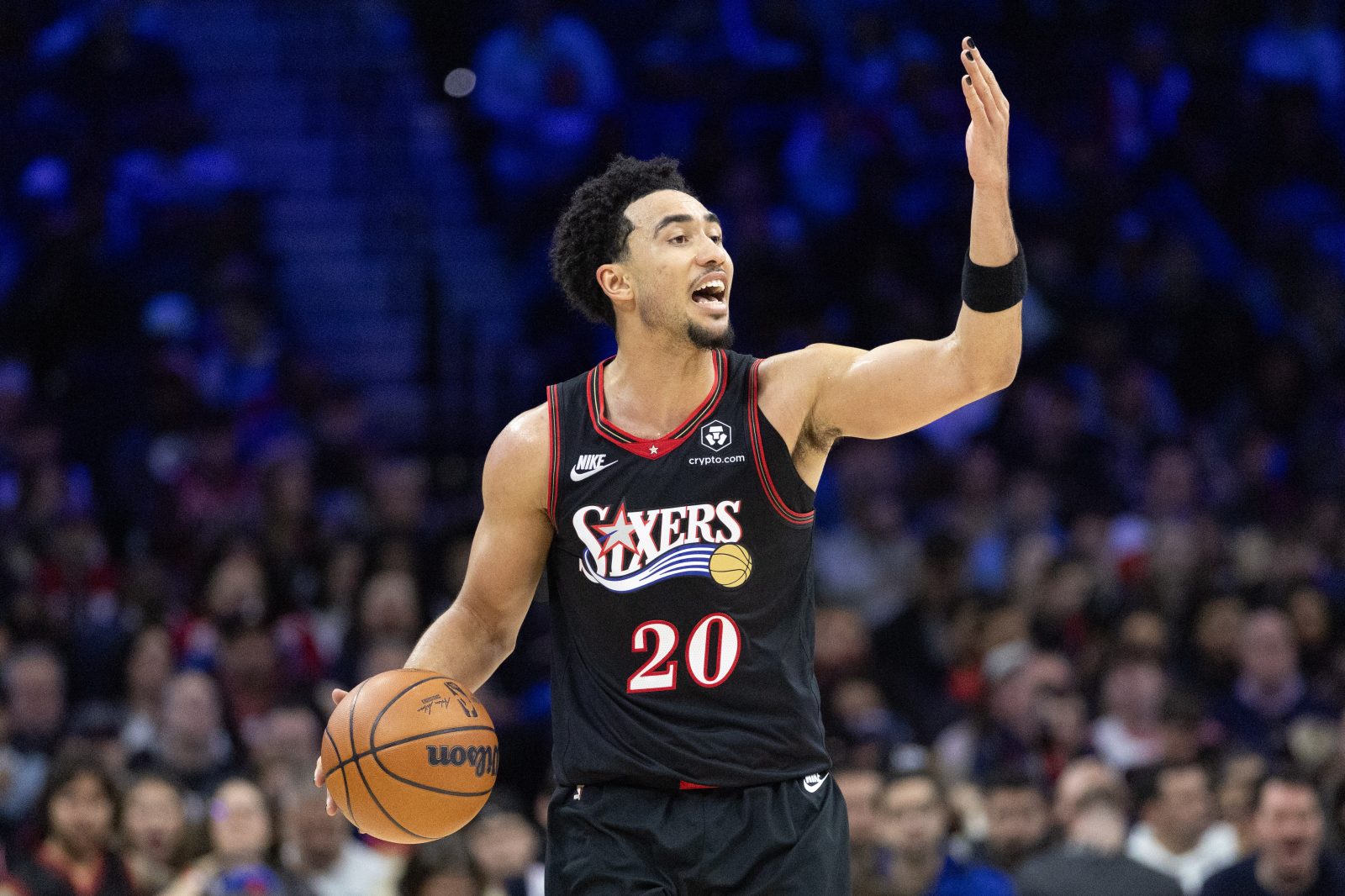 Dec 23, 2025; Philadelphia, Pennsylvania, USA; Philadelphia 76ers guard Jared McCain (20) controls the ball against the Brooklyn Nets during the third quarter at Xfinity Mobile Arena. Mandatory Credit: