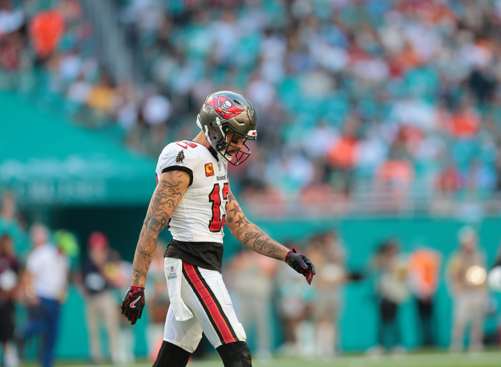 Dec 28, 2025; Miami Gardens, Florida, USA; Tampa Bay Buccaneers wide receiver Mike Evans (13) walks on the field during the fourth quarter against the Miami Dolphins at Hard Rock Stadium. Mandatory Credit: Sam Navarro-Imagn Images